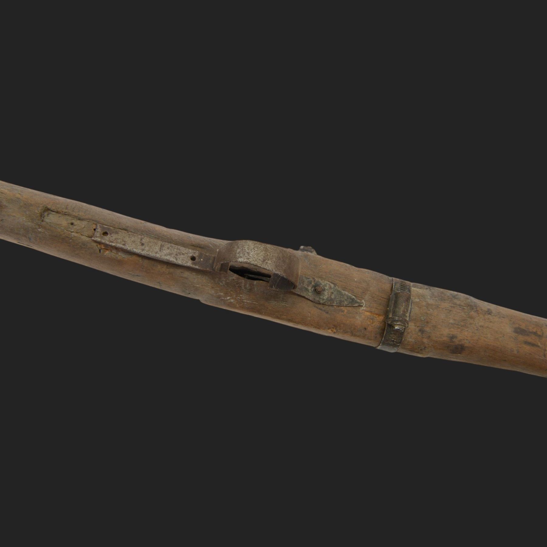 Middle Eastern percussion cap rifle, the 107cm  barrel with four brass bands and ramrod under, overall L143cm, together with another percussion rifle the 106cm barrel a copy of a 17th century Spanish barrel, complete with fake stamp, by vendors repute this rifle was confiscated from tribesmen in Kurdistan by police
Sold as an exempt item under Section 58 (2) of the 1968 Firearms Act, to be held as a curiosity or ornament