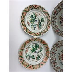 Pair of 19th century Chinese famille rose plates, decorated with floral spray within floral borders, D22.5cm, together with a further pair of 19th century Chinese plates decorated in the famille vert pallet, with seated figure in a landscape, within geometric borders, D21.5cm