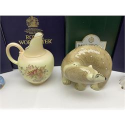 Two Royal Worcester candle snuffers from the connoisseur collection, comprising of Baby and Toby, together with Minton Fawn on Ivory Polar Bear and one other, all with original boxes 