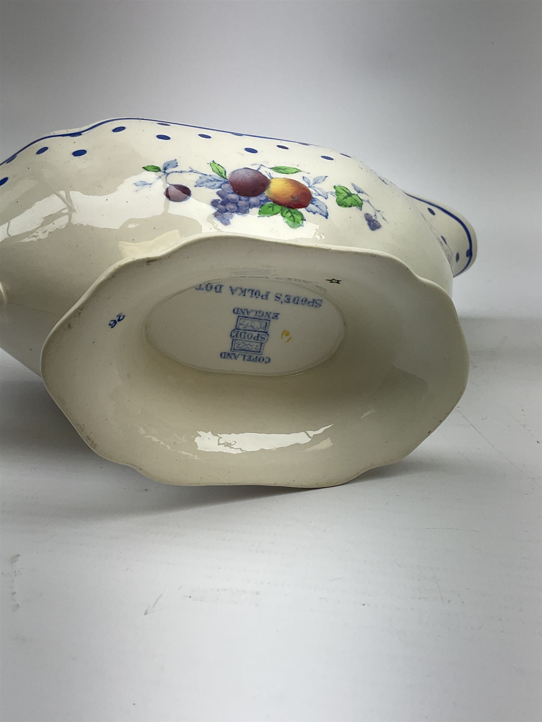 Copeland Spode Polka Dot pattern dinner and tea wares, comprising four dinner plates, seven salad plates, four dessert plates, six twin handled soup bowls and two saucers, six chocolate cups with covers and six saucers, two sauce boats, two tureens and covers, and four graduated serving platters. 