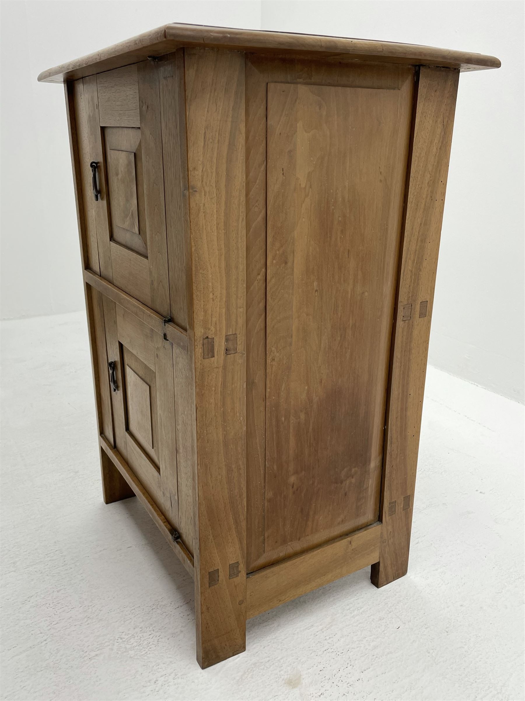 Ernest Gimson (1864-1919) - circa. 1904-1910, Arts & Crafts chestnut wood cabinet, visible wedged tenon joints, enclosed by two fielded panelled doors fitted with brass droplet handles, panelled sides and back, stile supports
Provenance: The vendor is a relative of Benjamin Fletcher who was headmaster of Leicester School of Art in the early 1900s. He was associated with Gimson and involved in setting up the Dryad company. 

The cabinet was acquired by Fletcher during his time in Daneway, Sapperton where Gimson had workshops. The cabinet stayed in the family and has been passed down to the current vendor.