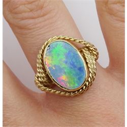 Gold oval opal doublet ring with rope twist design gallery, stamped 9ct