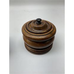 20th Century turned wood tobacco jar and cover, with ebonised knop finial, H11cm, together with a turned root desk stand with lidded ink well and compartment and pen holder (2)