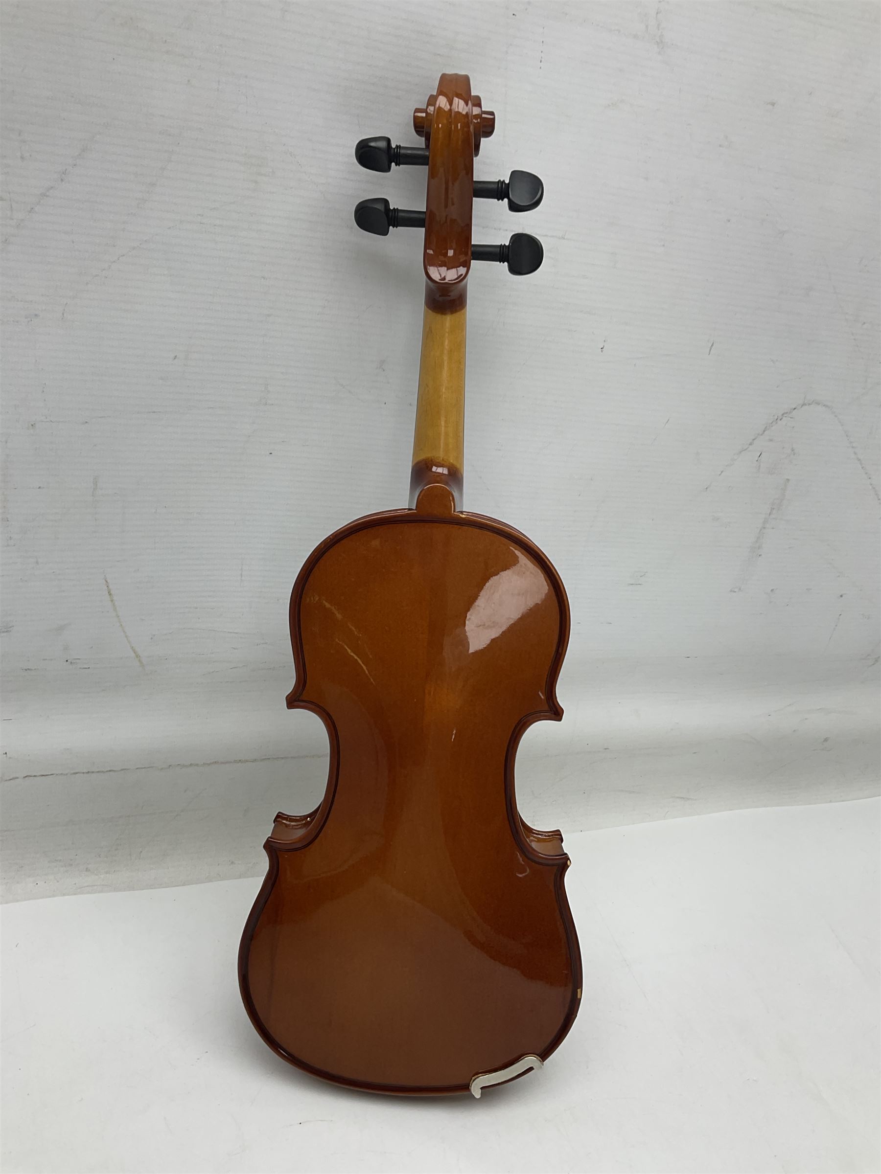 Four student violins - two Chinese three-quarter size with 33.5cm and 34cm two-piece backs; Stringers of Edinburgh quarter size with 28cm two-piece back; and Stentor quarter size with 28cm two-piece back; each in carrying case (4)
