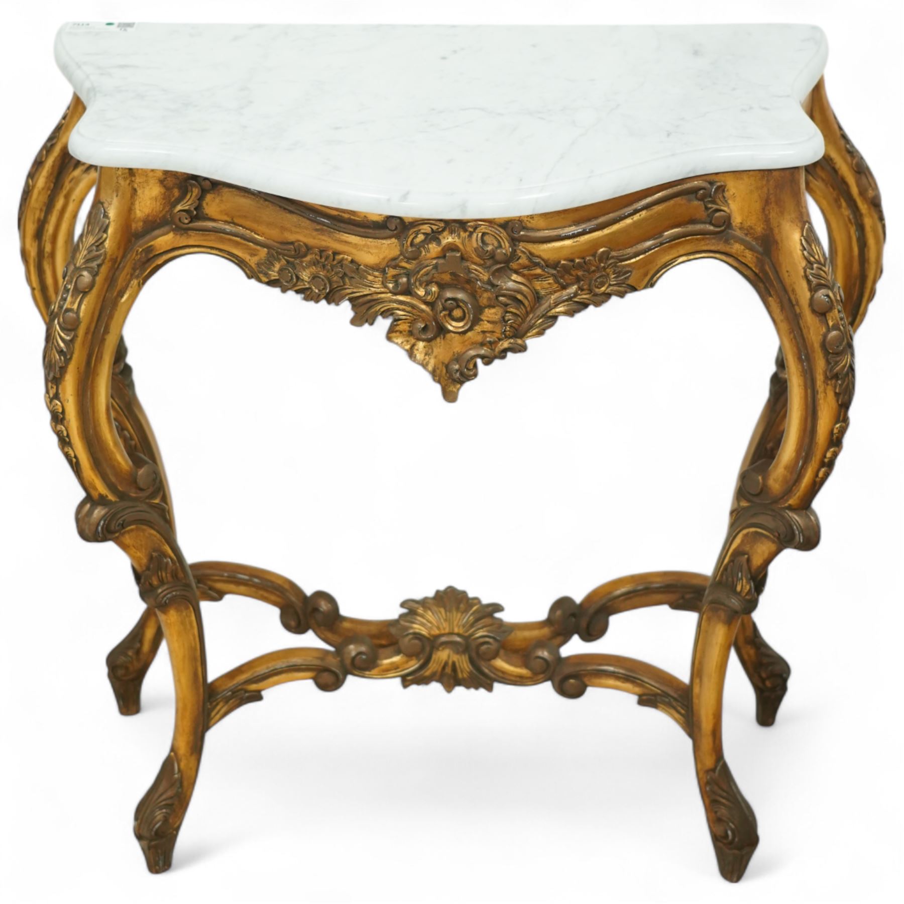 20th century Louis XV design giltwood console table, shaped white marble top over pierced and carved frieze with floral and foliate motifs, raised on cabriole supports united by X-shaped stretcher with central floral finial 