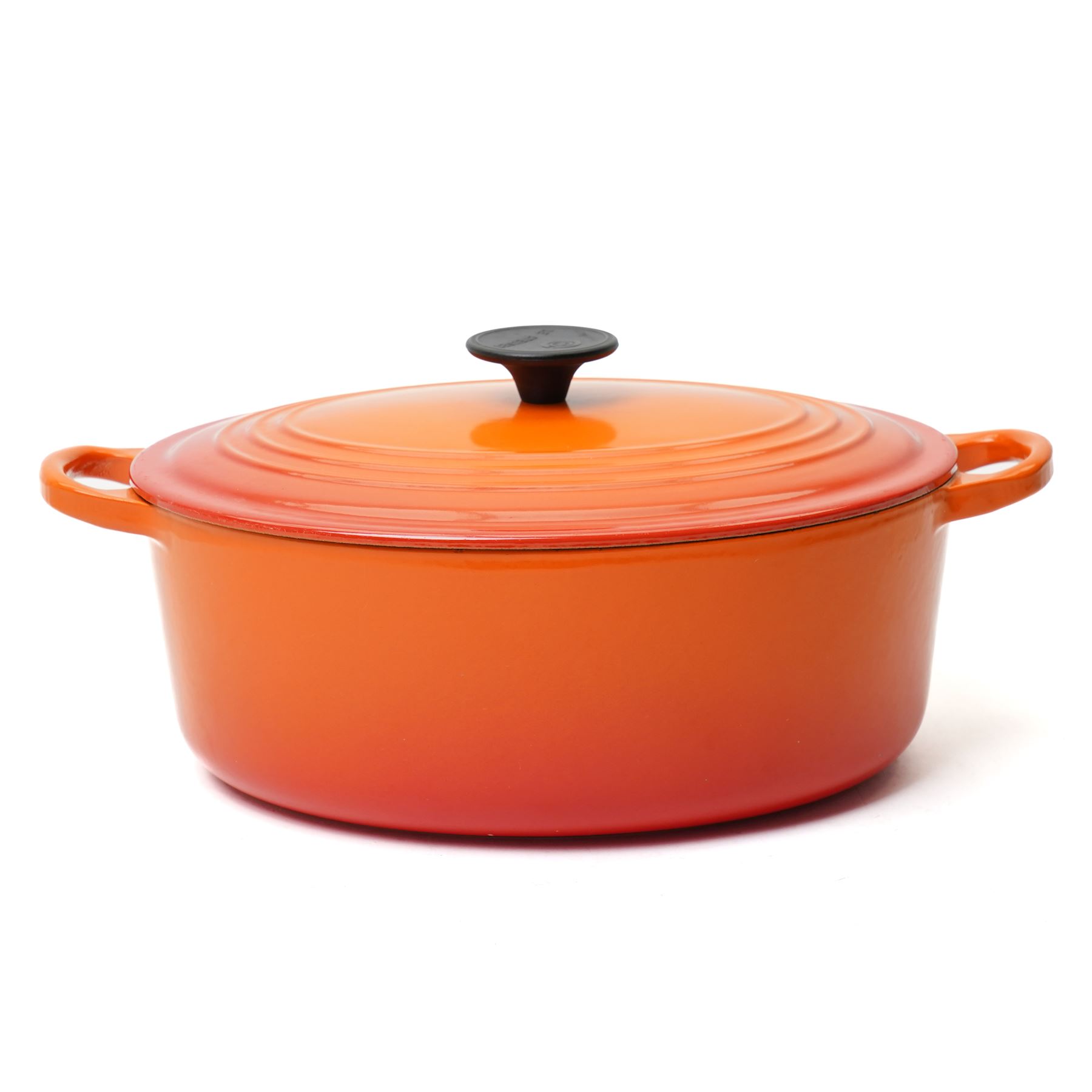 Le Creuset oval casserole dish and cover,  and another shallow example, in the Volcanic colourway