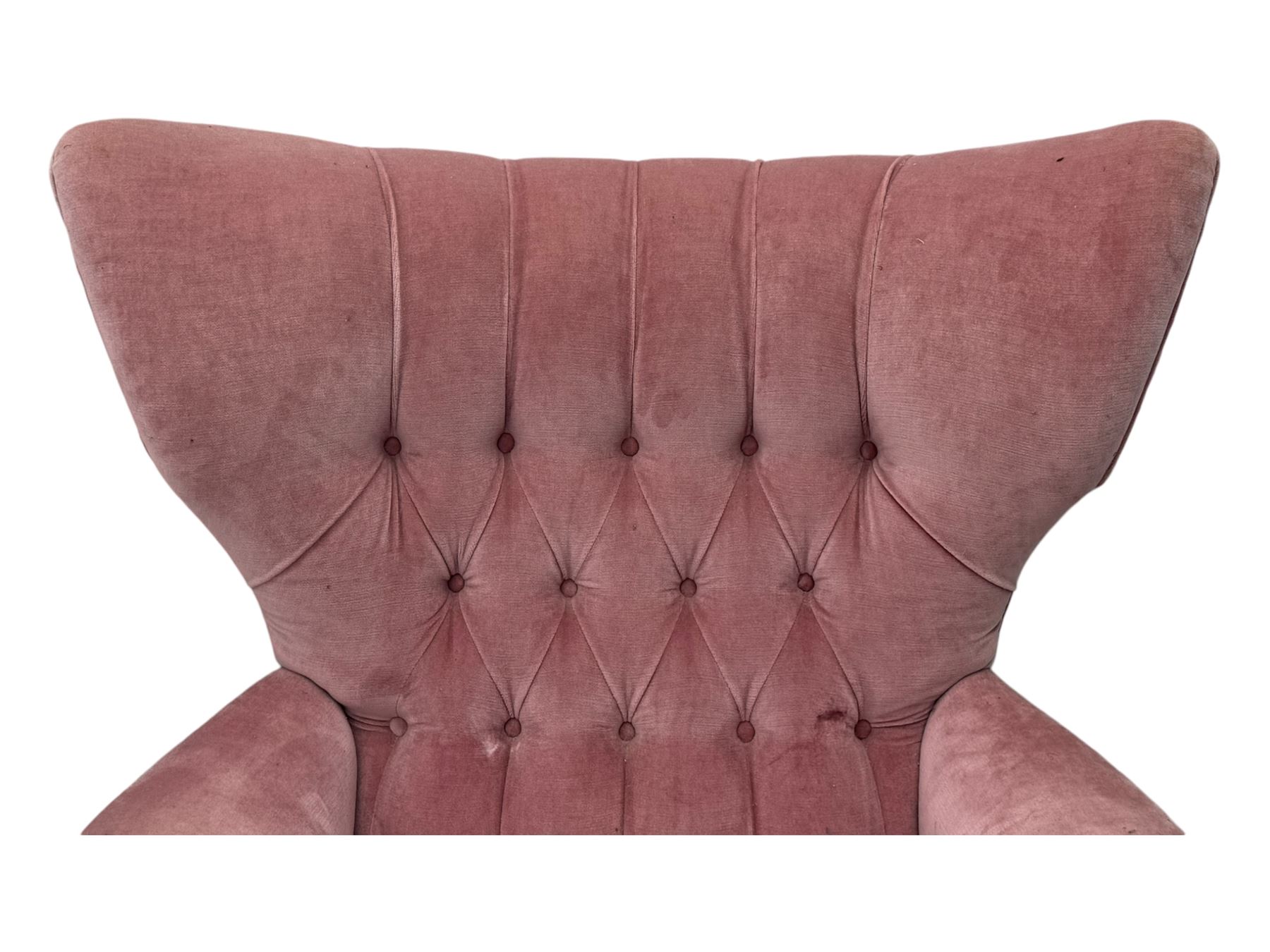 Paul Conti for G-Plan - 'Blofeld' Model 6250 swivel wingback armchair, upholstered in pink velour button back fabric, on teak base with castors