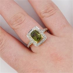 18ct gold alexandrite and diamond cluster ring by Lorique, single cushion cut alexandrite of 2.70 carat, with round cut diamond surrounded, Birmingham 2013, boxed with certificate