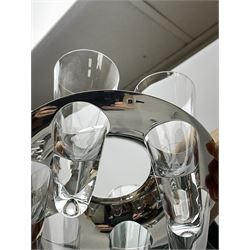 A St. Hilaire clear glass decanter and shot glass set, the ice bucket with removable steel insert, marked for St. Hilaire, Paris, supporting six conical glasses around a central bottle with later unassociated cover, bucket H15cm D15cm.