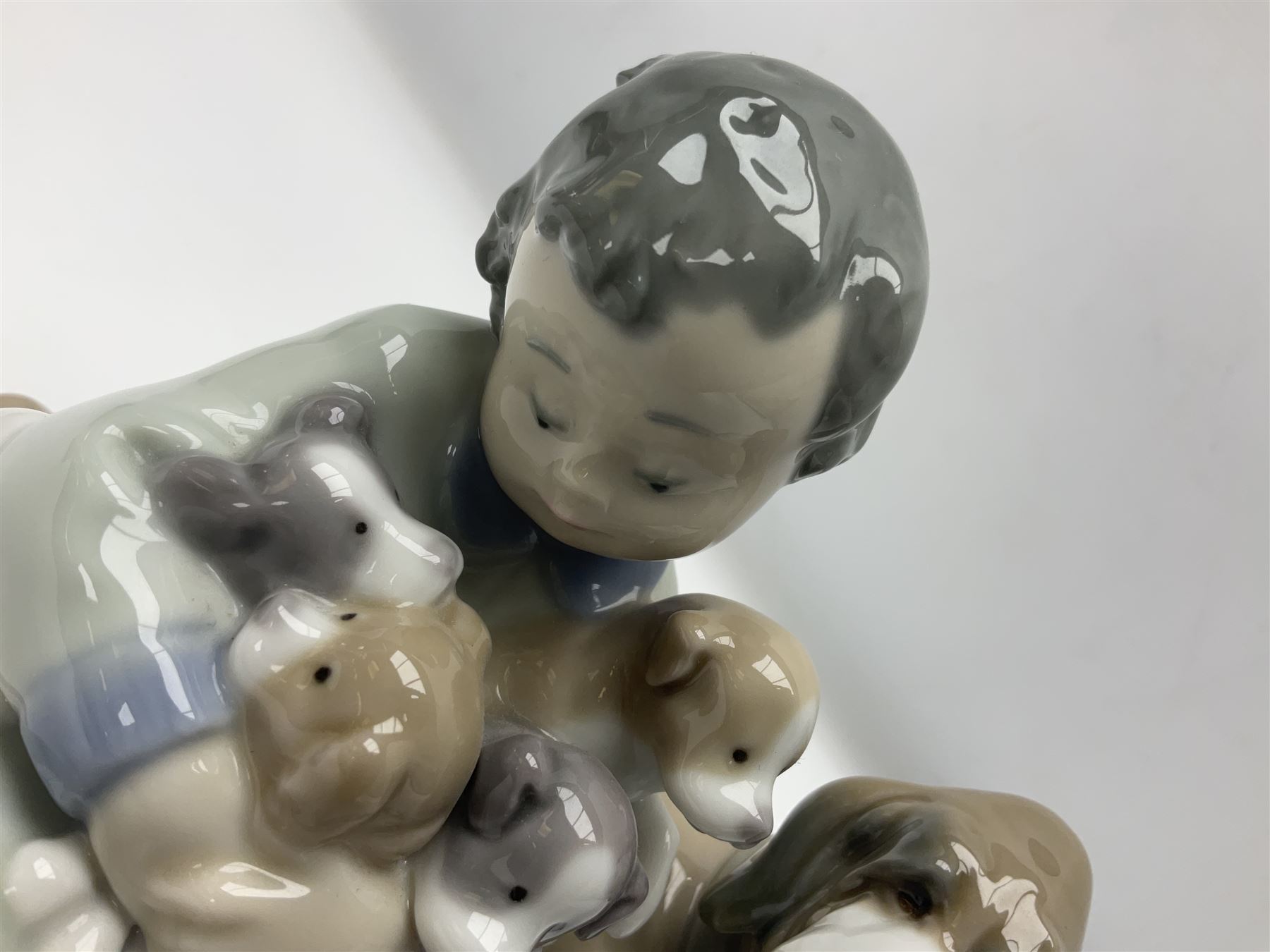 Pair of Lladro figures comprising 'Mis Amigos' model no 5456, and 'Bashful Bather' model no 5455, both with boxes