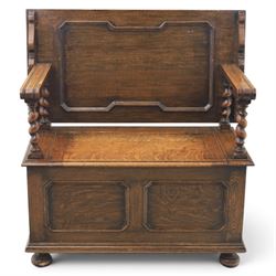 Early 20th century oak monks bench, panelled back converting to a table top, reeded armres...