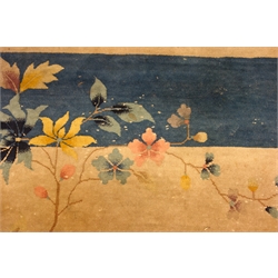  Large early 20th century Chinese carpet, beige ground with blue band border, decorated with flowers, butterflies and hanging lanterns, 407cm x 334cm  