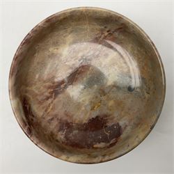 Pink veined marble bowl, of circular form, upon a spreading circular foot, D22cm, H12cm