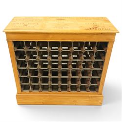 Traditional style pine wine rack, rectangular top with pyrography 'wine box' design, with apertures for fourty-eight bottles, on a plinth base