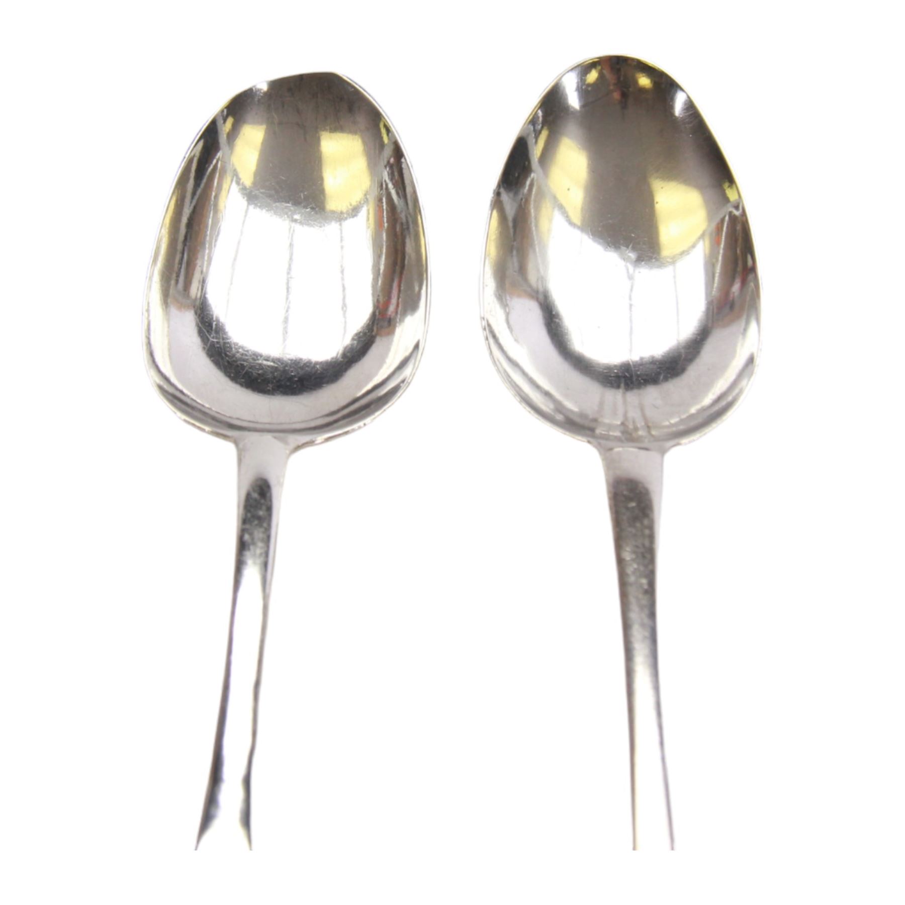 Two early/mid 18th century American silver Hanovarian pattern tablespoons with rat tail bowls, the first example marked for John Burt, Boston, circa 1730, the second marked for George Hanners, Boston, each approximately L19cm
