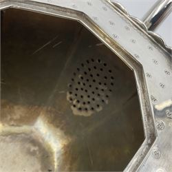 Victorian silver four piece tea service, comprising teapot, teapot stand, twin handled open sucrier and milk jug, each of octagonal form with foliate bud border and engraved decoration including crest to canted panels, and vacant panels, the teapot with ivory finial to the hinged cover and later wooden handle, hallmarked Edward Barnard & Sons Ltd, London1896, teapot including finial H15cm, milk jug including handle H16cm, teapot stand W11.5cm

This item has been registered for sale under Section 10 of the APHA Ivory Act