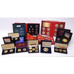  Collection of modern commemorative coins and coin sets including Queen Elizabeth II 'The 2012 Diamond Jubilee 65mm Coin', 'The HRH Prince George Five Crown Coin', '100th Anniversary of the House of Windsor' commemorative collection comprising five medallions, 'Her Majesty's 90 Glorious Years Commemorative Coin & Stamp Set' etc, many being cased with certificates  