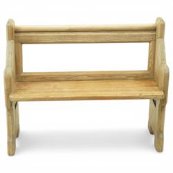 19th century pine pew of small proportions, open rectangular back with panelled frame, rou...