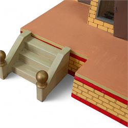 Moritz Gottschalk three storey wooden dolls house model 3589, with two side openings, with blue roof, painted exterior and wallpapered and painted interior, similar example featured in 'The Genius of Moritz Gottschalk' book, page 57, including chimney H100cm