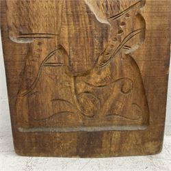 20th century hardwood Dutch folk art Speculaasplank or biscuit mould, typically carved with figure in traditional dress, H132cm