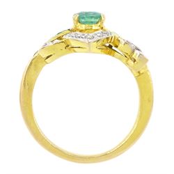 Gold emerald and diamond ring, the principal oval cut emerald, with three calibre cut emeralds set either side, within a diamond set fancy openwork setting
