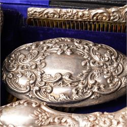 Victorian silver backed six piece dressing table set  with embossed decoration and engraved with initials in original case Chester 1900 Maker Charles Cooke