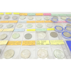  Collection of German coins including Bundesrepublik Deutschland coin sets 1975 to 1979, in plastic display cases, various East and West German commemorative silver coins etc, in coin album pages  