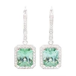Pair of platinum African Paraiba tourmaline and diamond earrings by Scarab London, each pe...