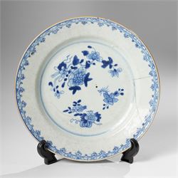 Three Chinese Kangxi period blue and white plates, painted in underglaze blue with various patterns, including Butterfly and Rockery, Pagoda and River Landscape, and floral sprays, each approx. D23cm (3)