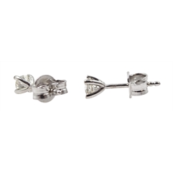 Pair of 18ct white gold single stone diamond stud earrings, stamped 750, diamond total weight 0.40 carat