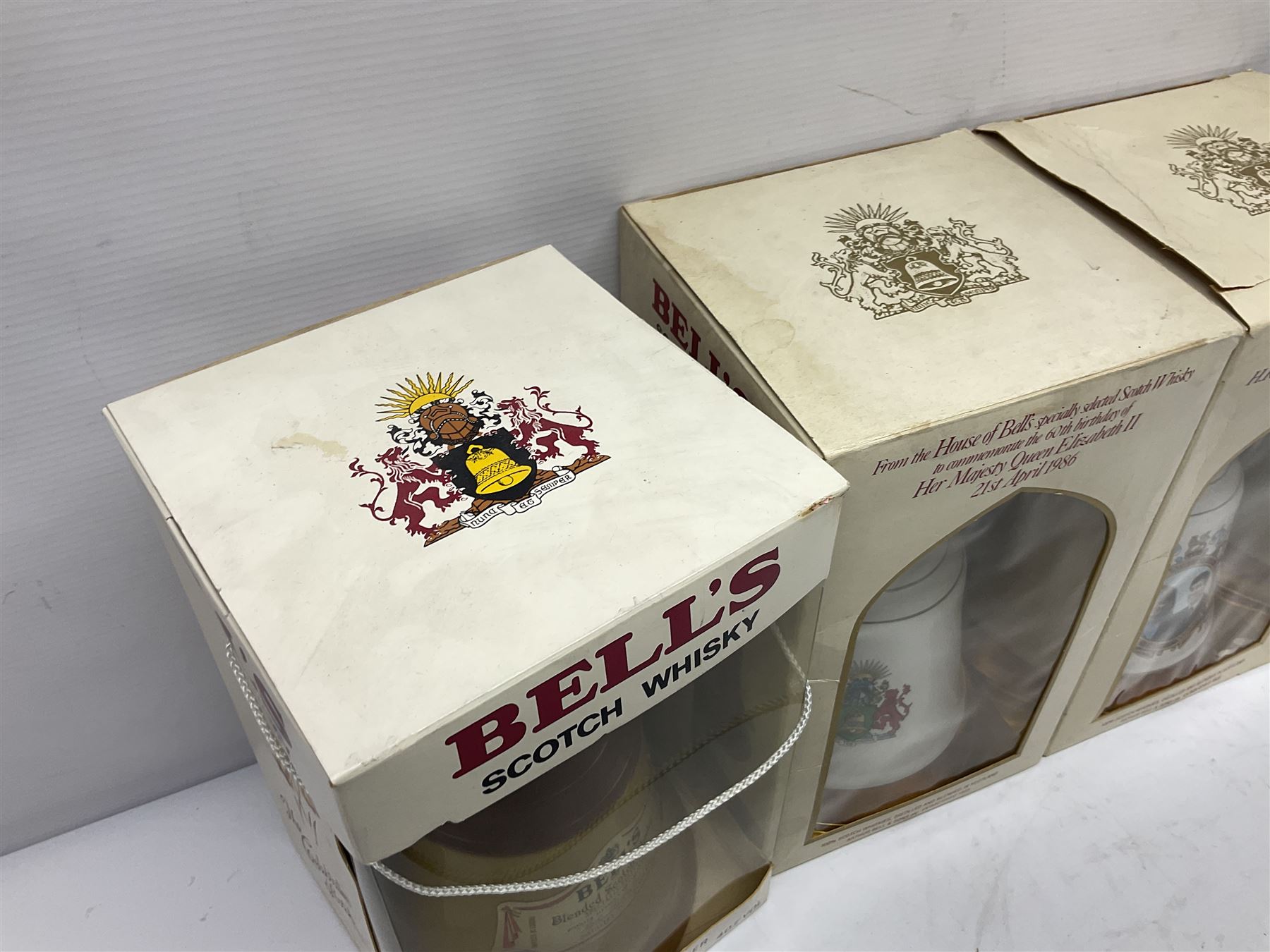 Bells, Scotch whisky, in eight Wade ceramic decanters, including Christmas 1992, Queens 60th birthday, Birth of Prince William etc, various contents and proof   
