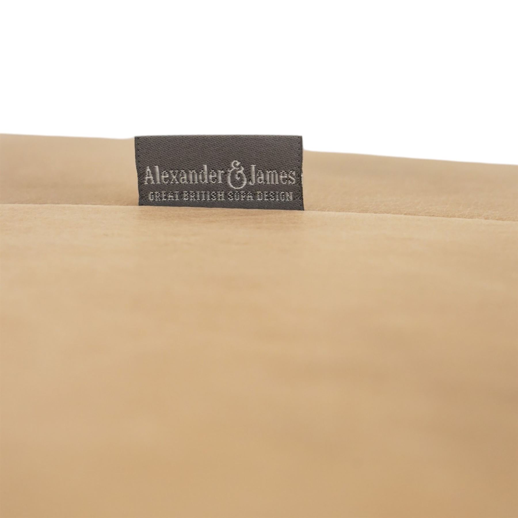 Alexander James - Chesterfield tan three seat sofa, button backed with scrolled arms, brass studded trim raised on light wood turned feet