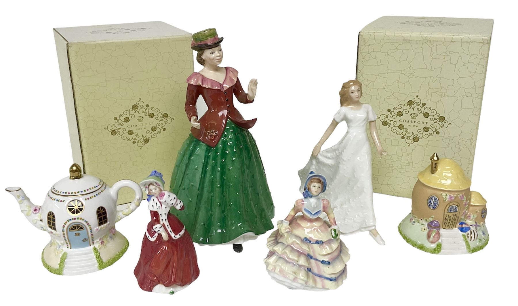 Two Coalport cottages, comprising Teapot cottage and Easter Cottage, together with four Royal Doulton figures, including Holly and Friendship 