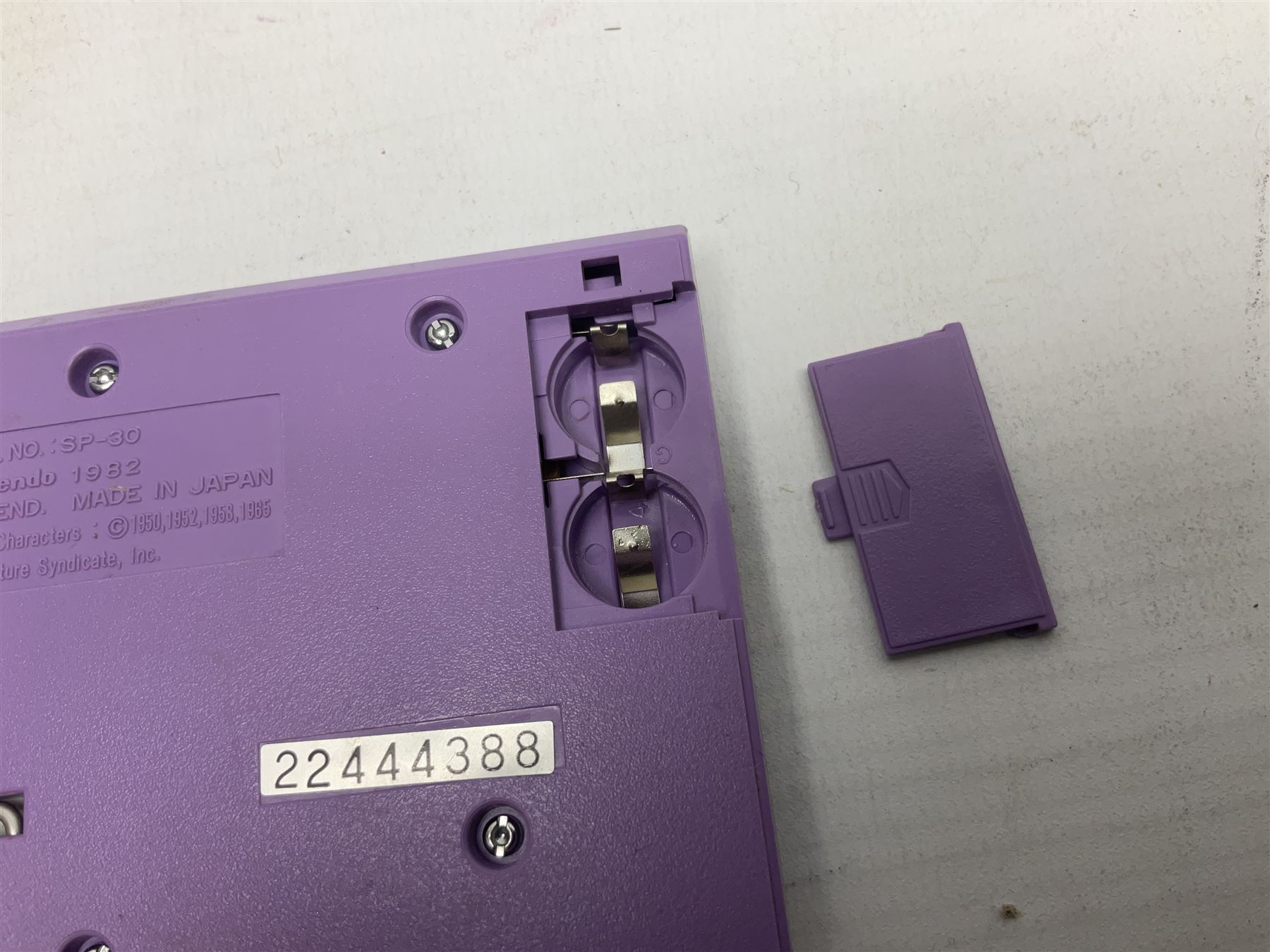 Collection of retro handheld games, including Nintendo Game & Watch ‘Snoopy Tennis’ (1982) and ‘Squish’ (1986) both with instruction booklets, Casio CG-600 ‘Star Invader’ with box, 3 in 1 LCD cartridge game including ‘Soccer’, ‘Invader’ and ‘Bomb Finder’ games, and two Grandstand ‘Pinball Wizard’ (1988) games, both with original boxes