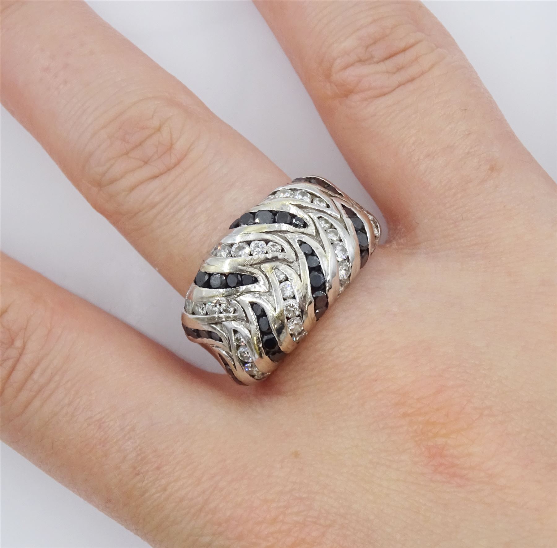 18ct white gold round brilliant cut black and white diamond rubover set ring