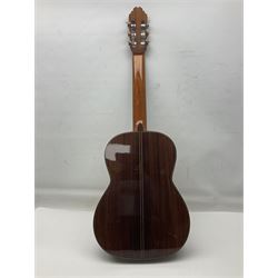 British hand made classical acoustic guitar by Huw Morgan with Indian rosewood back and sides and spruce top; bears label dated May 1998; L100cm; in Tribal Planet lightweight carrying case