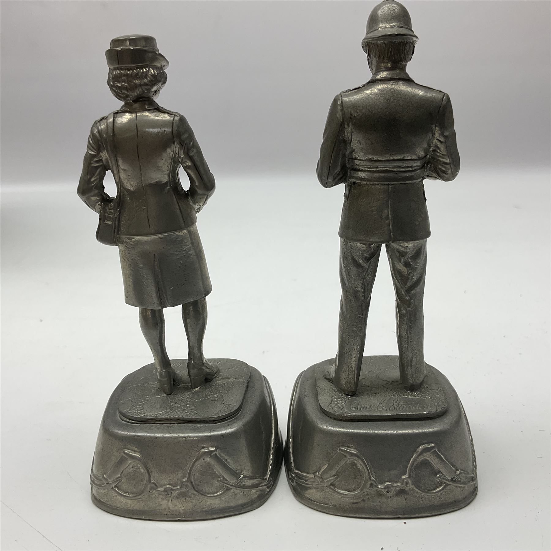 Police - Victorian turned hardwood truncheon with traces of decoration and VR cypher L42cm; Humberside Police helmet with Queens Crown helmet plate; hand lamp inscribed 'The Inspector'; and small pair of pewter figures of police officers (5)