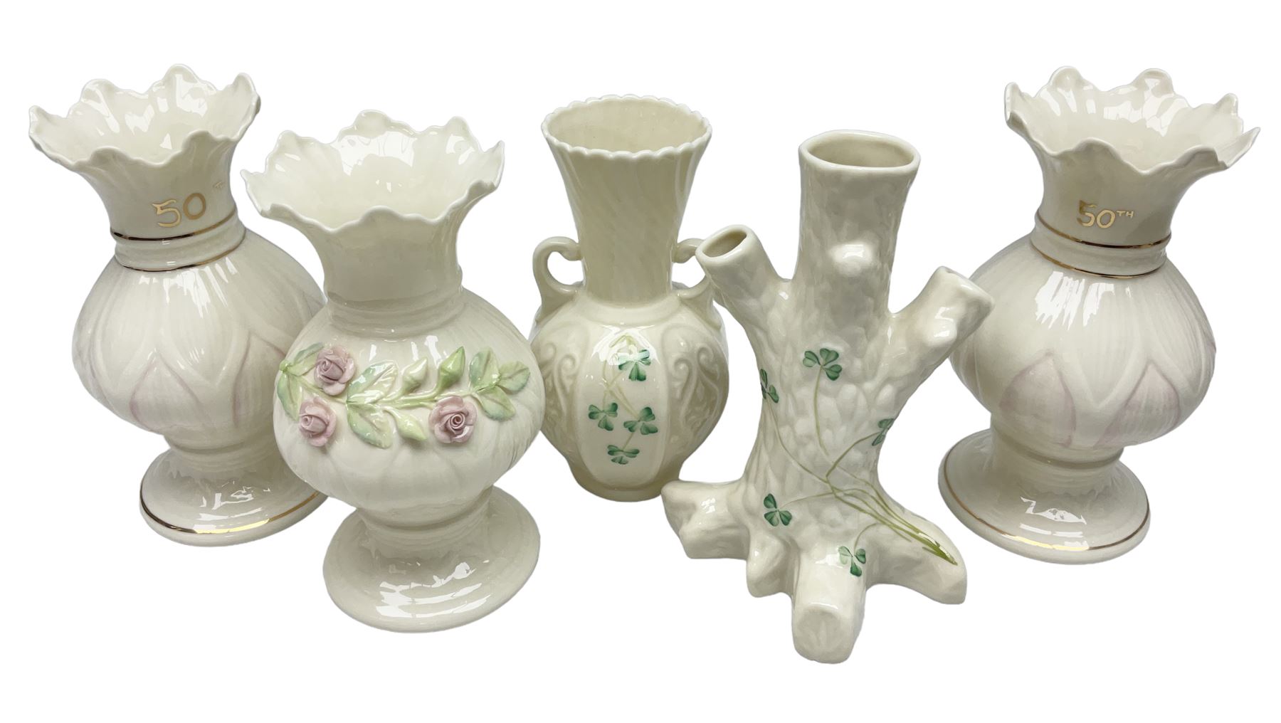 Five late 19th/early 20th century and later Belleek vases, comprising pair of Lotus Blossom examples, shamrock tree trunk vase, twin handled shamrock vase and a baluster form vase decorated with applied roses, all with printed marks beneath, tallest H16cm