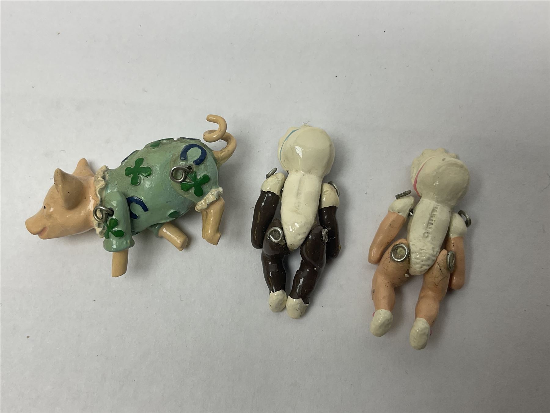 Six Hantel miniature articulated pewter figures, including Father Christmas, Drummer, pig etc 