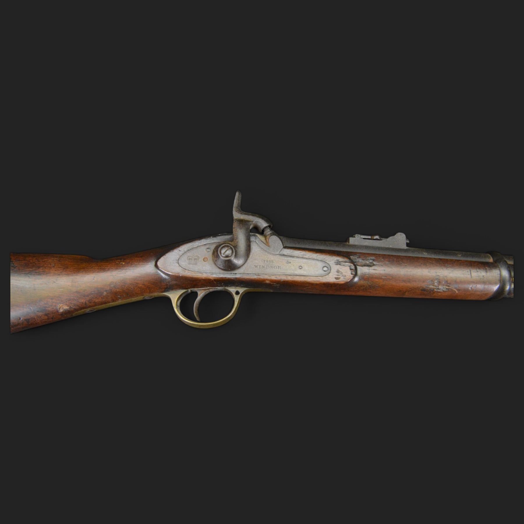 Two-Band short service musket, the L66cm barrel with sold out of service marks and indistinct marks, with ram rod beneath, the lock marked with crowned and Windsor 1855, overall L108cm
Sold as an exempt item under Section 58 (2) of the 1968 Firearms Act, to be held as a curiosity or ornament