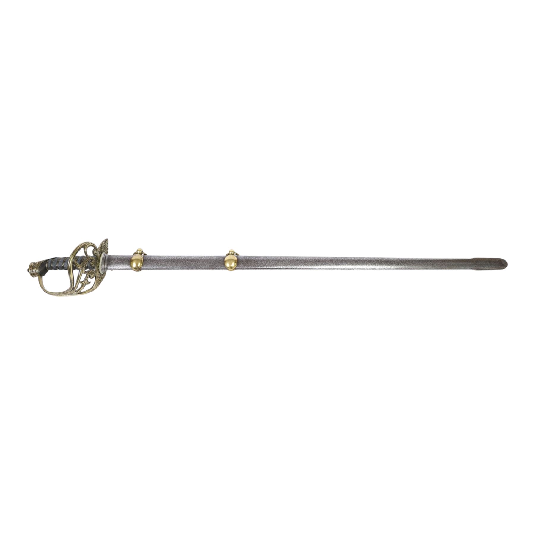 British 1832 pattern, Royal Horse Guard state sword, by Henry Wilkinson Pall Mall London, circa 1862, the 92cm straight fullered single edged blade retaining virtually all original polish, makers name to the ricasso and marked 11767 to the top, the brass basket 'honeysuckle' guard bears the Victoria crown to both the inside and outside faces, shagreen bound grip with triple silver wire, with steel scabbard with mounts and twin suspension rings, overall 110cm