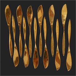 Extensive suite of WMF 800 silver gilt cutlery, for twelve covers, comprising twelve table knives and forks, fish knives and forks, dessert forks, table spoons, dessert spoons, teaspoons, eleven dessert forks and six serving spoons, with crescent moon and crown WMF hallmarks