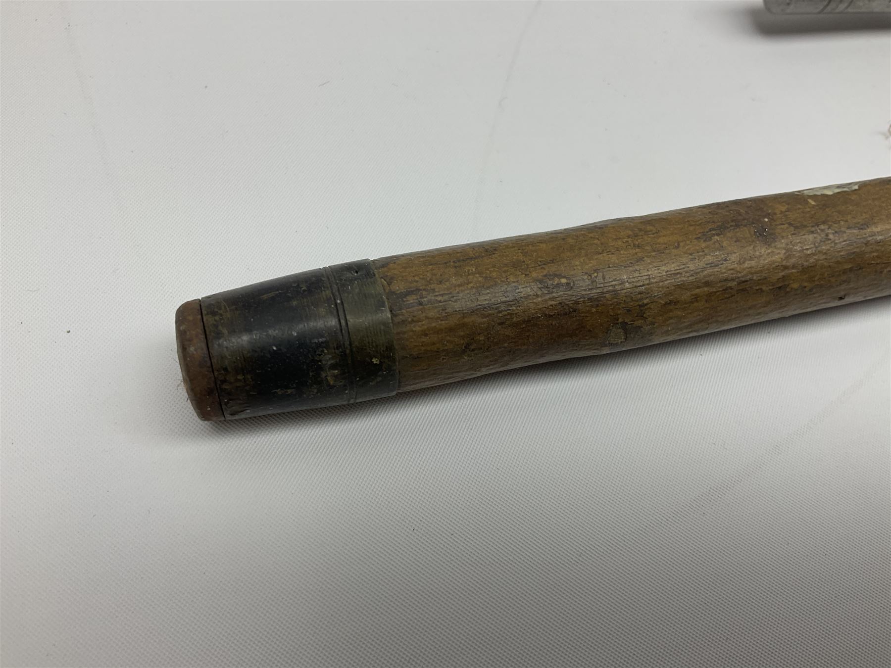 Four wooden walking canes, including a carved mahogany snooker cue example, tallest H86cm