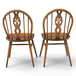 Ercol - Set of four dark elm 'Fleur De Lys' chairs
