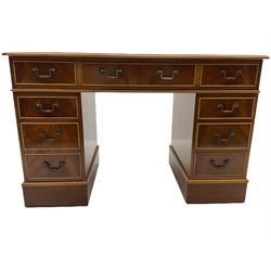 Late 20th century mahogany twin pedestal desk, fitted with nine drawers, inset leather writing surface