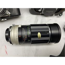 Miranda Sensorex camera body, Miranda Sensorex II camera body with 'Auto Miranda 1:1.8 f-59mm' lens, 'Auto Miranda 1:2.8 f-135mm' lens, 'Auto Miranda 1:3.5 f-200mm' lens, 'Auto Miranda 1:2.8 f-28mm' len, Agfa plate camera with 9cm x 12cm plates and other camera equipment including Miranda camera bag