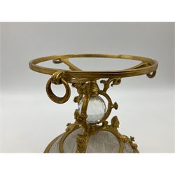 Pair of 19th century Osler glass and ormolu table centrepieces, each with circular hobnail and star cut glass dish supported upon an ormolu stand detailed with drop rings and masks, containing a central cut glass sphere, and hobnail cut dome to base, upon three compressed bun feet, each impressed Osler, D22.5cm H16cm