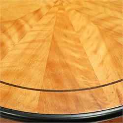 Mid-20th-century Biedermeier-style ebonized and satinwood pedestal table, quarter-veneered circular top with ebonized edge above a tapered baluster quarter-lobed column, raised on a circular plinth base, D87xH70cm, together with two matching upholstered spoon back chairs W45xD47xH87cm