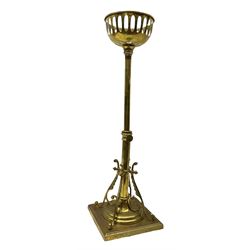 Victorian brass telescopic oil standard lamp, raised upon four scrolling feet of stylised feather form upon stepped square base, H58.5cm fully extended