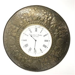 Wall clock in copper style repousse circular mount